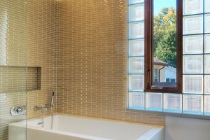 BATHROOM - AKDO LIGHT MOJAVE BROWN 1X6 BRICK, ANATOLIA ZERA ANNEX CARBON, BLACK PEBBLES