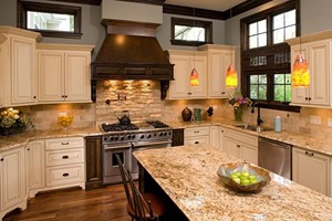 KITCHEN BACKSPLASH - ANATOLIA IVORY TUMBLED 3X6 AND IVORY SPLIT FACE LEDGESTONE